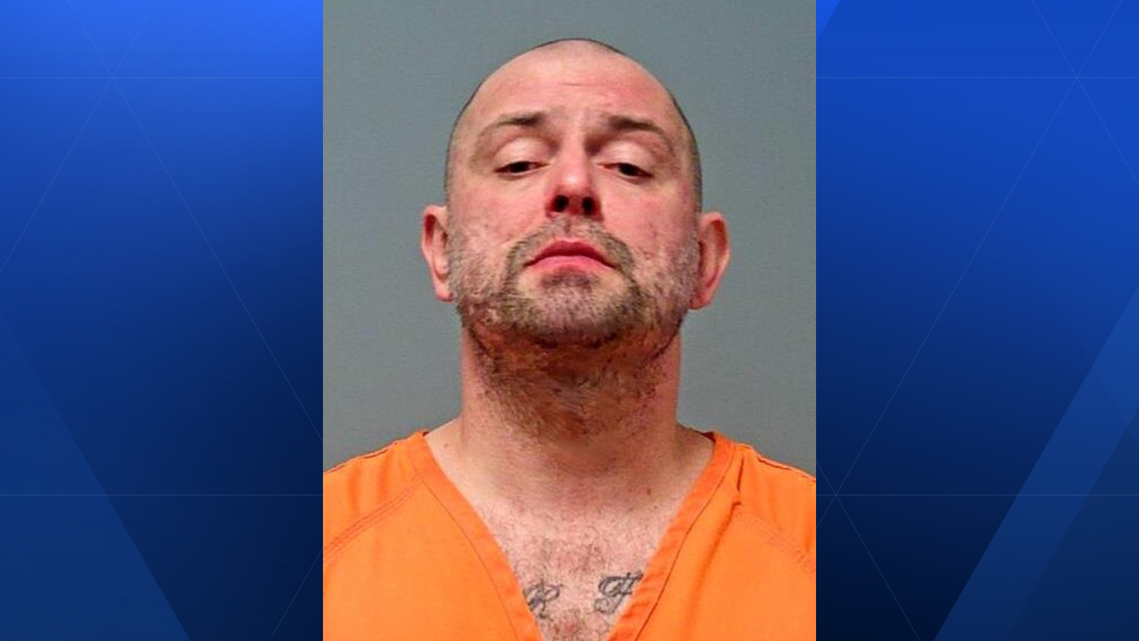 Man arrested after allegedly firing off dozens of shots near officers at hotel in Deerfield Township