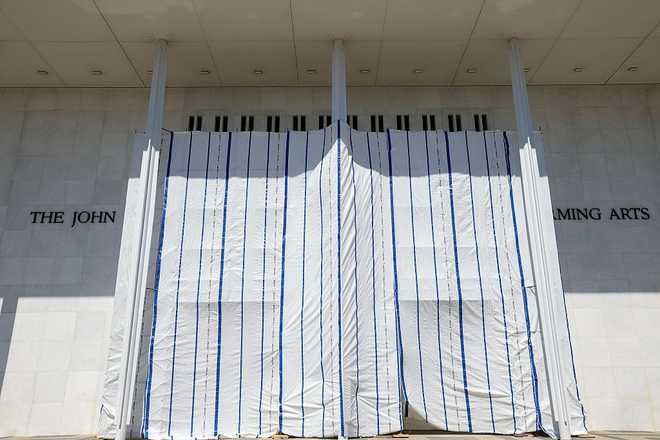WASHINGTON, DC - JUNE 13: Tarps are hung on scaffolding outside The Kennedy Center on June 13, 2026 in Washington, DC. Friday late night workers removed the President Donald Trump&amp;apos;s name from the Kennedy Center. (Photo by Tasos Katopodis/Getty Images)(Photo by Tasos Katopodis/Getty Images)