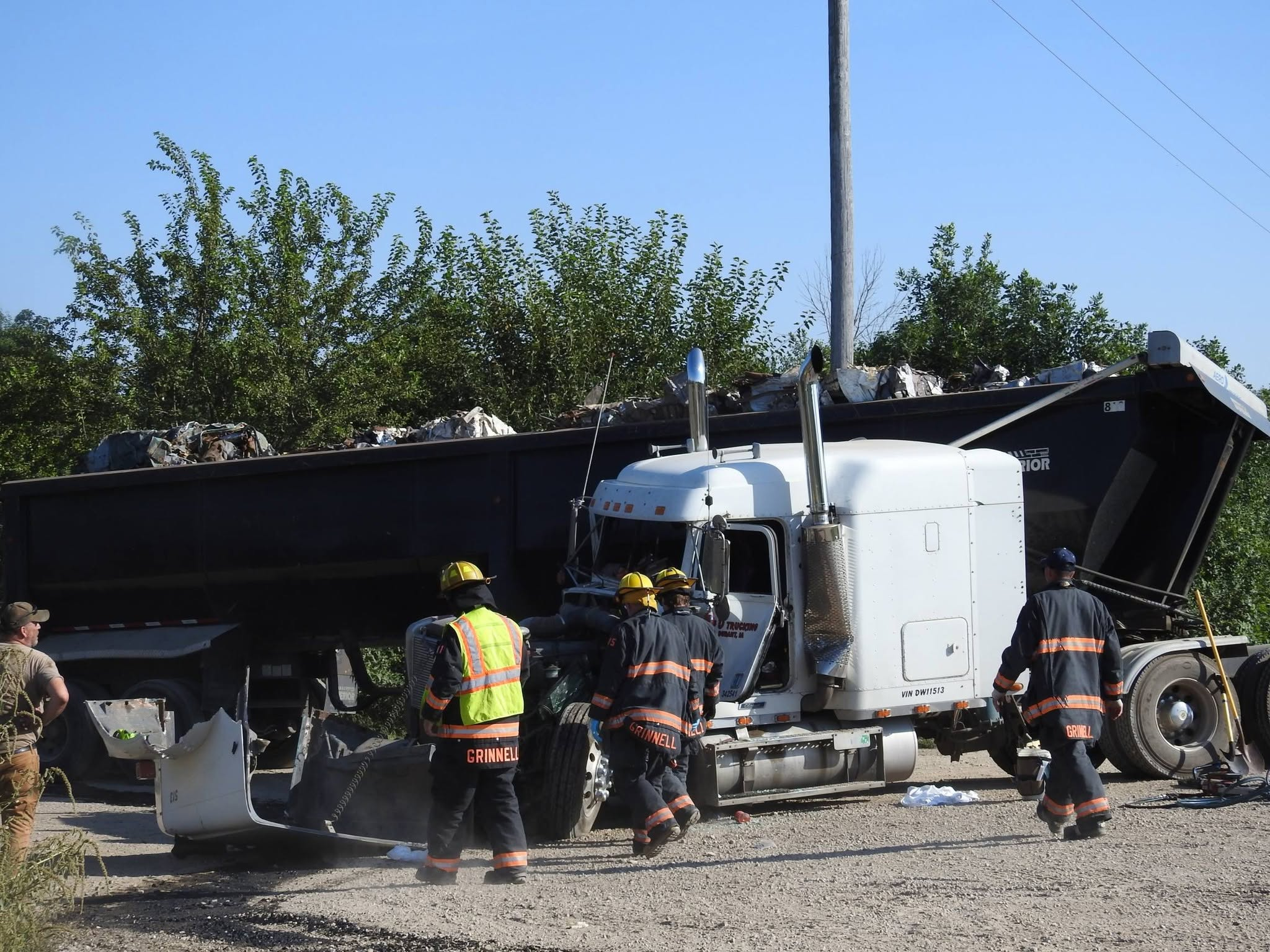 Driver pulled from cab after train strikes semi in Iowa