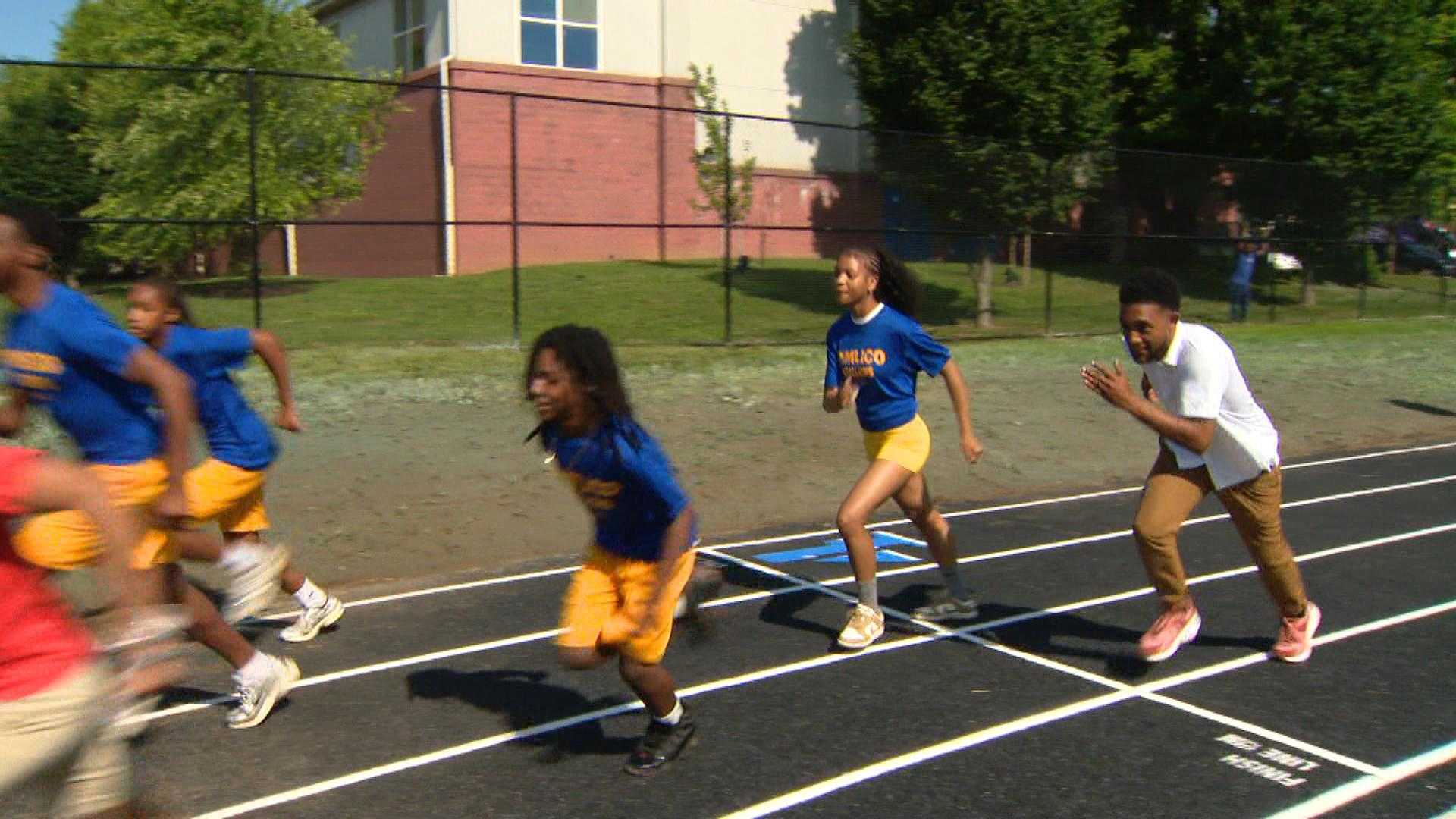 Mayor runs with Pimlico students to open new track
