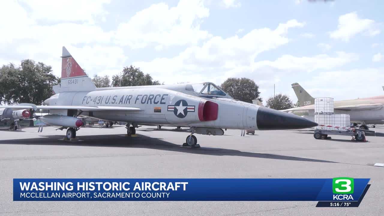 Volunteers clean historic military planes at California museum