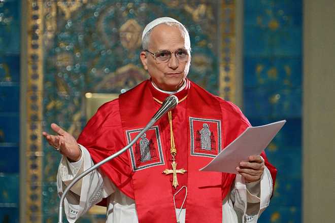 Pope Leo XIV addresses the Algerian community in the Basilica of Our Lady of Africa, in Algiers on April 13, 2026. Pope Leo XIV embarks today on an 11-day visit to Algeria, Cameroon, Angola and Equatorial Guinea for his first major international trip since becoming pontiff last year. (Photo by Alberto PIZZOLI / AFP via Getty Images)