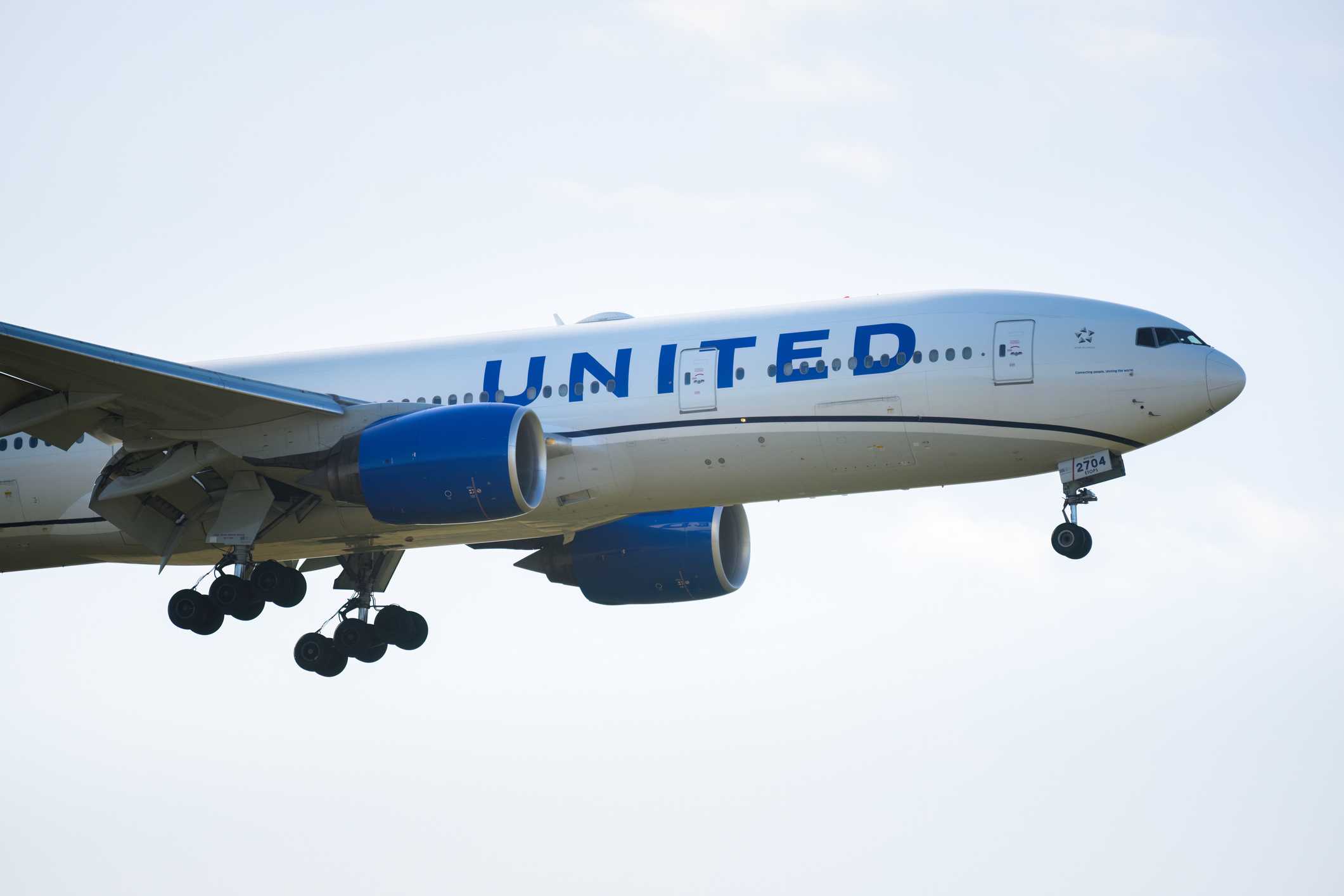 Passenger detained after 'multiple attempts' to breach United Airlines cockpit, crew member says