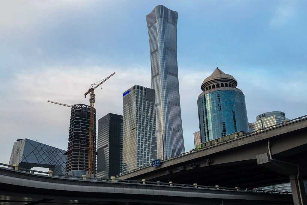 Small aircraft crashes into Beijing skyscraper