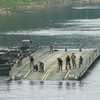 North Korea fires about 10 short-range ballistic missiles toward the sea, South Korea says