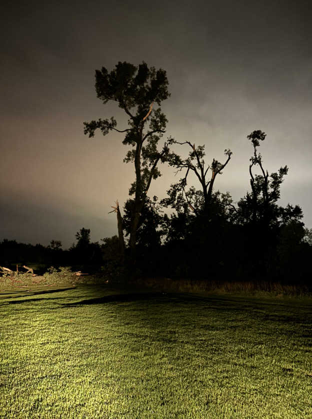 Golf course storm damage is shown.