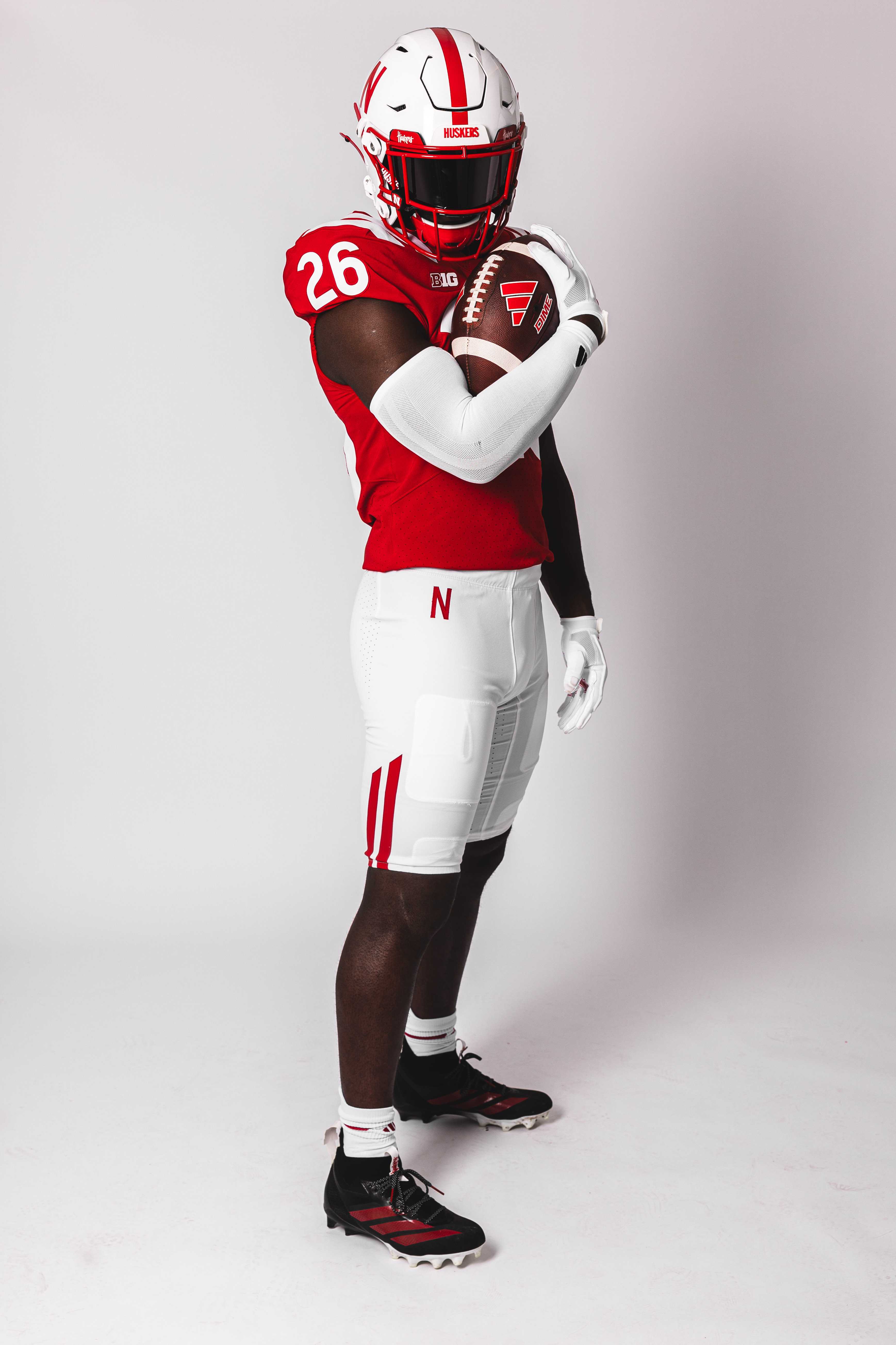Husker football unveils new home and away uniforms following Battle of the Boneyard tournament