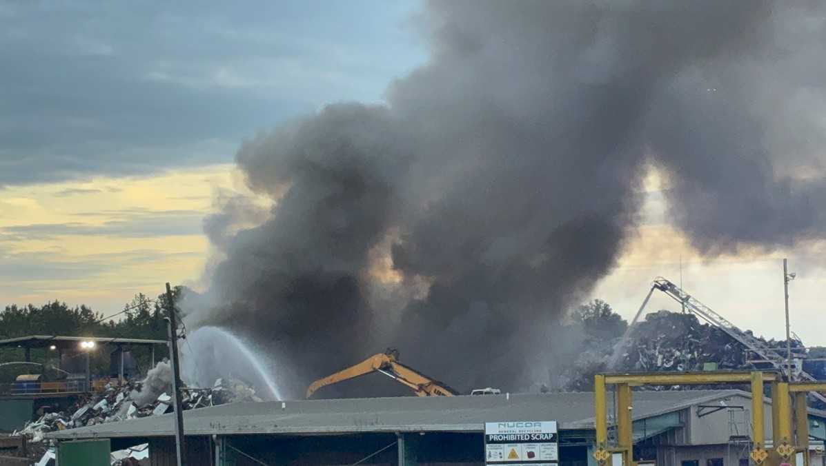 Black smoke and flames rising from the Nucor General Recycling fire in Flowood, Mississippi.