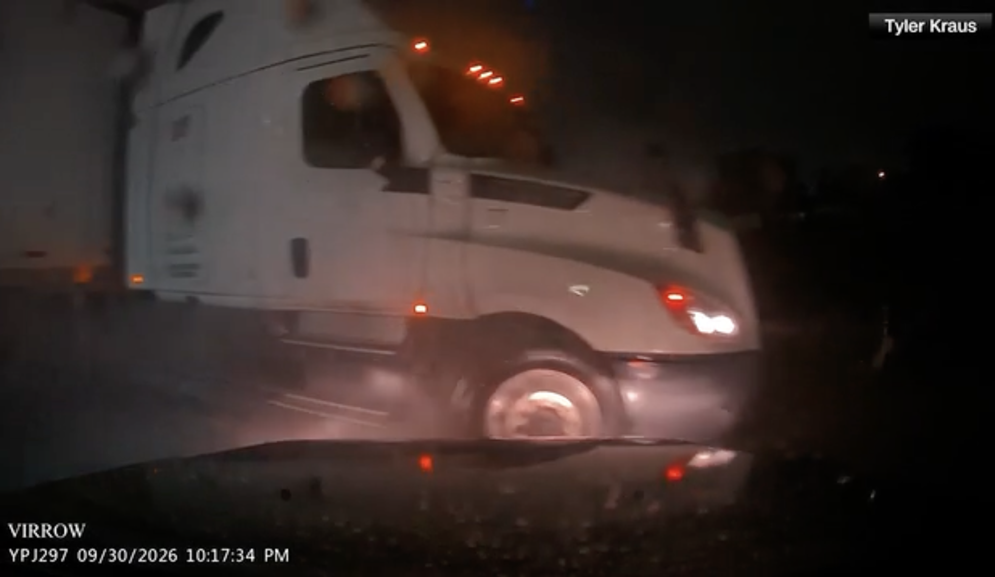 VIDEO: Out-of-control semi-truck narrowly avoids hitting vehicle on slick highway