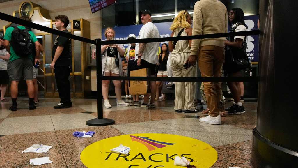 6 people hurt in stabbings at New York's Penn Station with a suspect in custody, authorities say