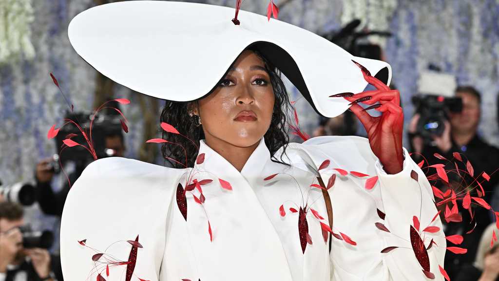 Met Gala guests arrive on carpet in dramatic works of art AP 50 MIN