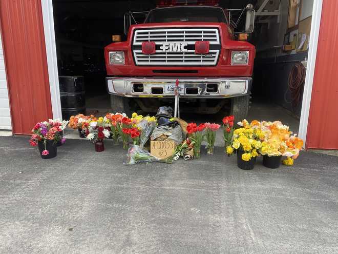 A memorial outside Andrew Cross's fire station.