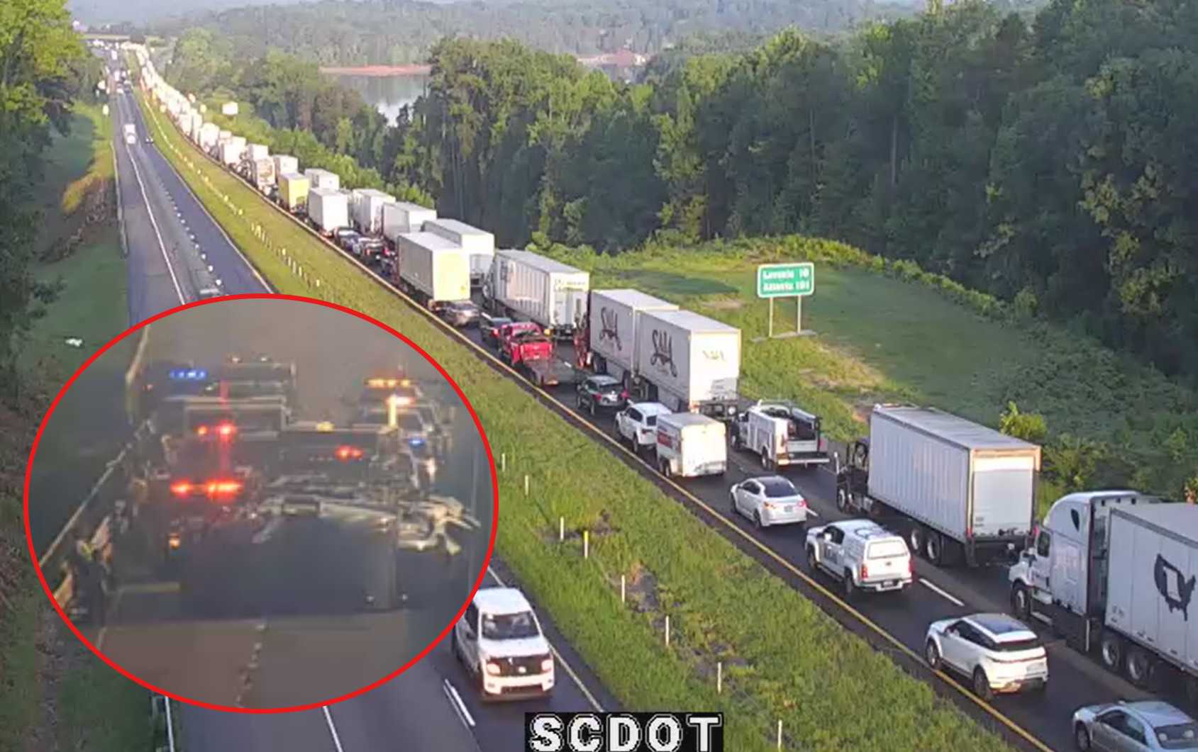 Car hauler overturns on I-85 spilling oil into Lake Hartwell; lanes still blocked