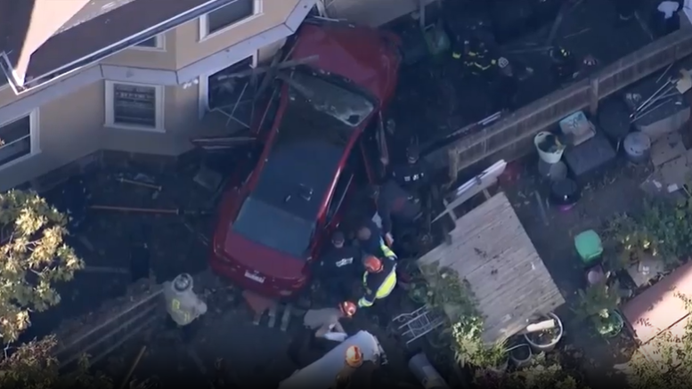 Breaking News: 2 people removed from car wedged into Boston home in Jamaica Plain crash 3 MIN