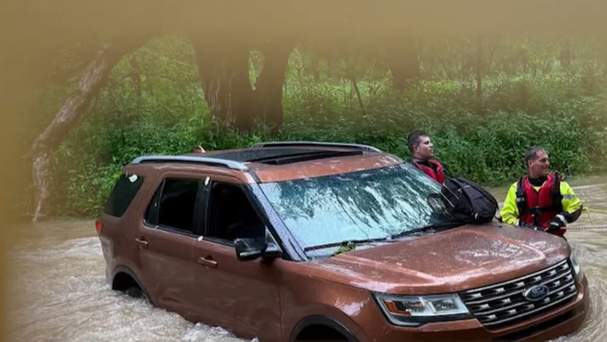 Video captures dramatic rescue after Indiana floodwaters sweep SUV into stream