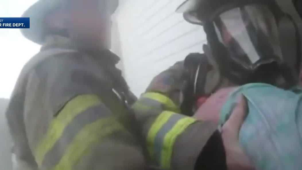 Terrifying moment | Helmet cam shows dramatic rescue from Pennsylvania house fire
