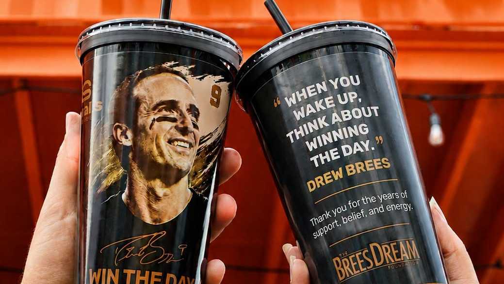 Small Sliders selling collectible Drew Brees cup with a portion of sales going to the Brees Foundation