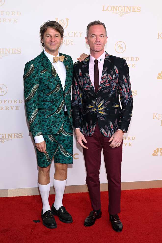 LOUISVILLE, KENTUCKY - MAY 02: (L-R) David Burtka and Neil Patrick Harris attend the Kentucky Derby 152 at Churchill Downs on May 02, 2026 in Louisville, Kentucky. (Photo by Daniel Boczarski/Getty Images for Churchill Downs)