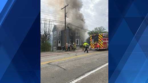 House catches fire across the street from high school building in Western Pa.