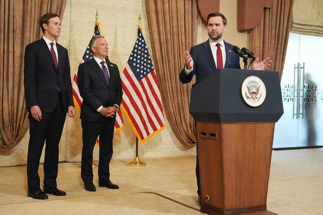 Vice President JD Vance, right, speaks during a news conference after meeting with representatives from Pakistan and Iran as Jared Kushner, left, and Steve Witkoff, Special Envoy for Peace Missions listen, on Sunday, April 12, 2026, in Islamabad, Pakistan.