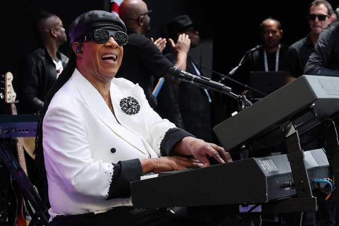 Stevie Wonder performs during the dedication ceremony for the opening of the Barack Obama Presidential Center in John Lewis Plaza on June 18, 2026 in Chicago, Illinois.