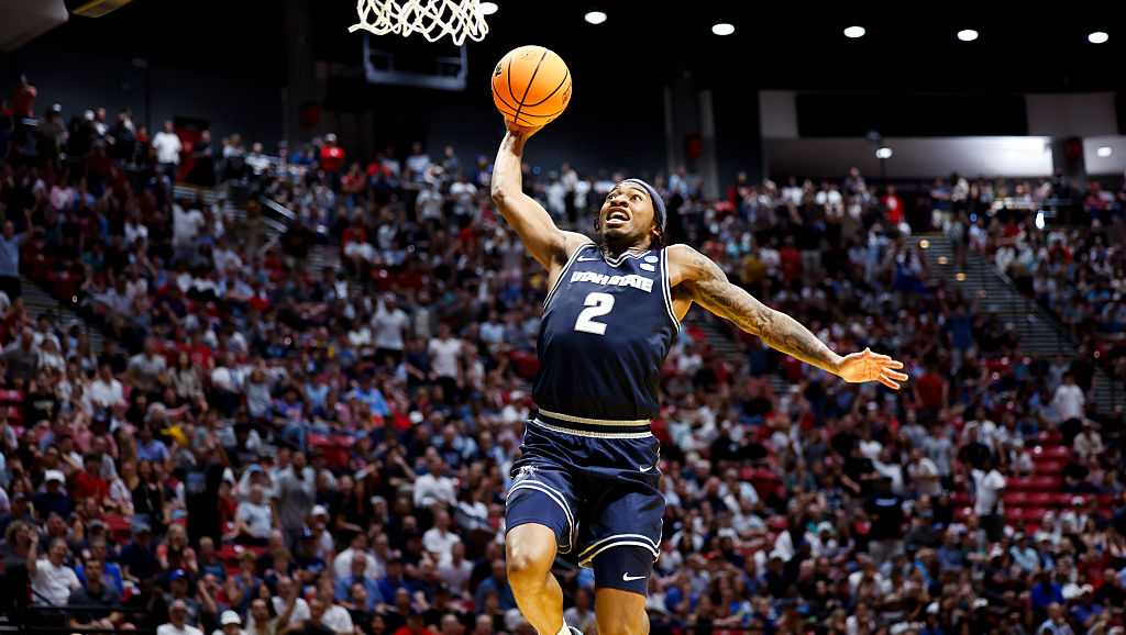 Former Utah State star Collins begins practicing with Bearcats after court ruling