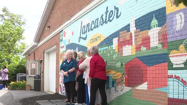 Lancaster unveils mural at visitor center on Greenfield Road
