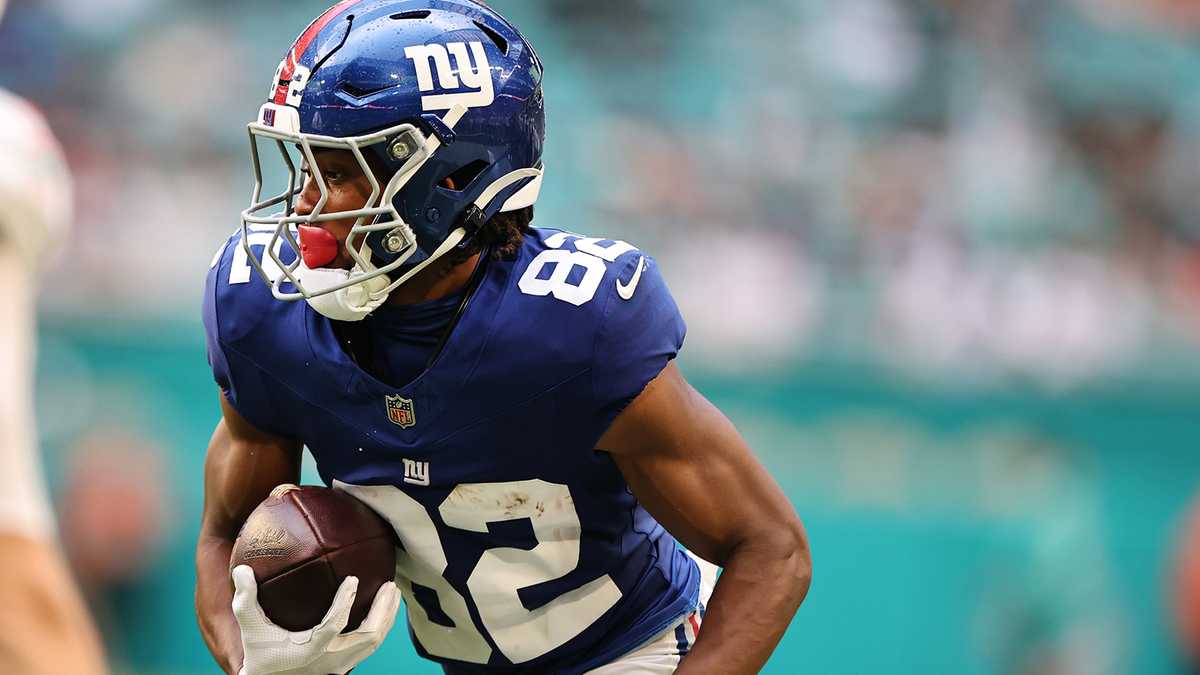 Photo: WTAE MIAMI GARDENS, FLORIDA - AUGUST 22: Calvin Austin III #82 of the New York Giants rushes against the Miami Dolphins during