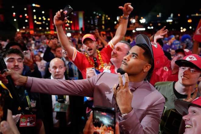 LSU defensive back Mansoor Delane celebrates after being chosen by the Kansas City Chiefs with the sixth overall pick during the first round of the NFL football draft, Thursday, April 23, 2026, in Pittsburgh.
