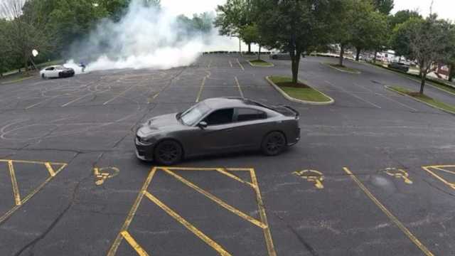 VIDEO: Cars do burnouts in Louisville church's parking lot; police looking for driver
