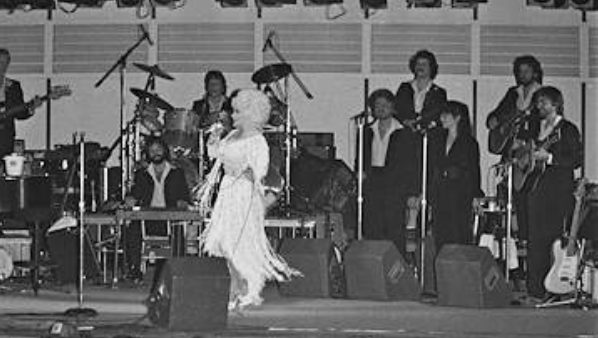 Historical photo of Dolly Parton and Porter Wagoner on stage in 1970 Iowa State Fair