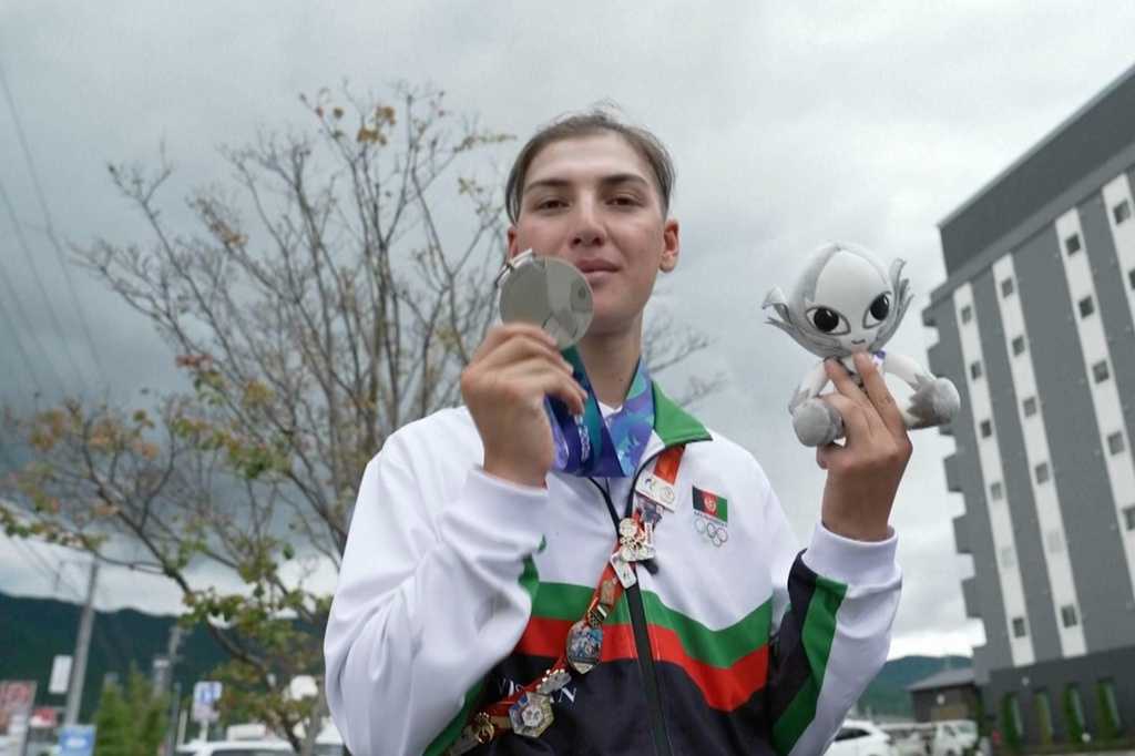 Afghan female cyclist wins silver at Asian Games after disguising herself as a man to train