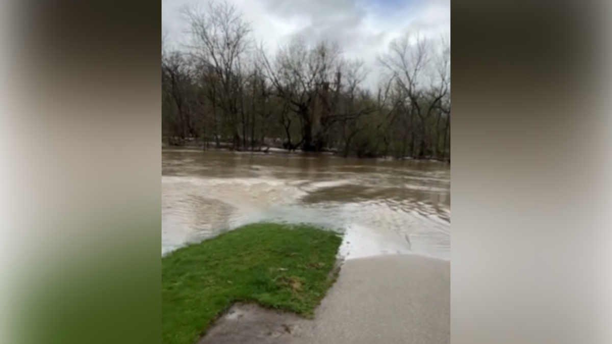 Menomonee River floods parkway, soccer field in Wauwatosa