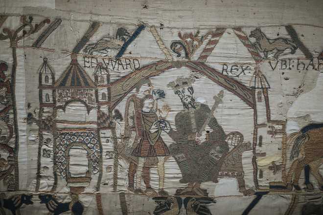 FILE - This file photo taken, Sept. 18, 2019 shows a detail of the 11th century Bayeux Tapestry chronicling the Norman conquest of England, in Bayeux, Normandy, France.