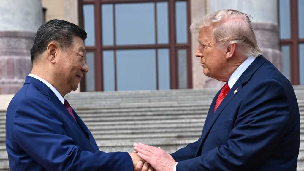 Trump praises Xi while Chinese leader warns of possible confrontation during Beijing summit