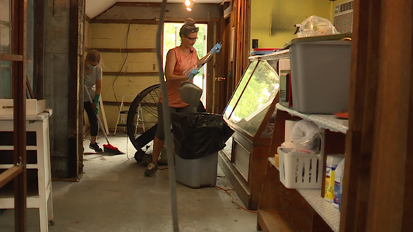 Families, shop owners, volunteers help Metamora recover after historic flooding