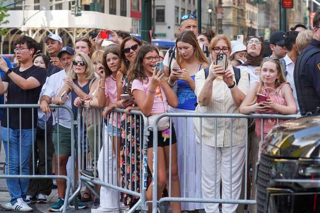 Fans line up outside of Madison Square Garden ahead of a reported wedding between singer Taylor Swift and National Football League player Travis Kelce on Friday, July 3, 2026, in New York.