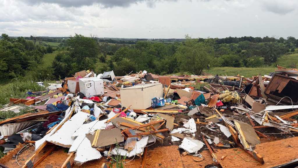 Tornadoes pummel communities outside Chicago, tearing up homes and toppling power poles