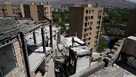 Damage is visible on a residential building that, according to Iranian authorities, was hit by a strike on March 4 during the U.S.-Israeli military campaign, in southeastern Tehran, Iran, Tuesday, April 14, 2026.