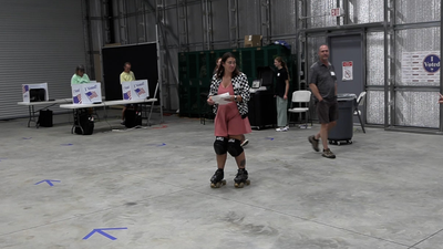 VIDEO: Precinct clerk laces up roller skates to glide through shift at South Carolina polling placewdsu