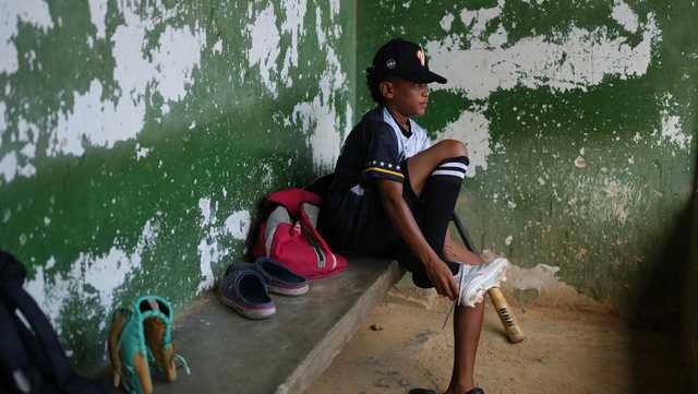 A 12-year-old baseball standout trains through tears after Venezuela quakes leave him homeless