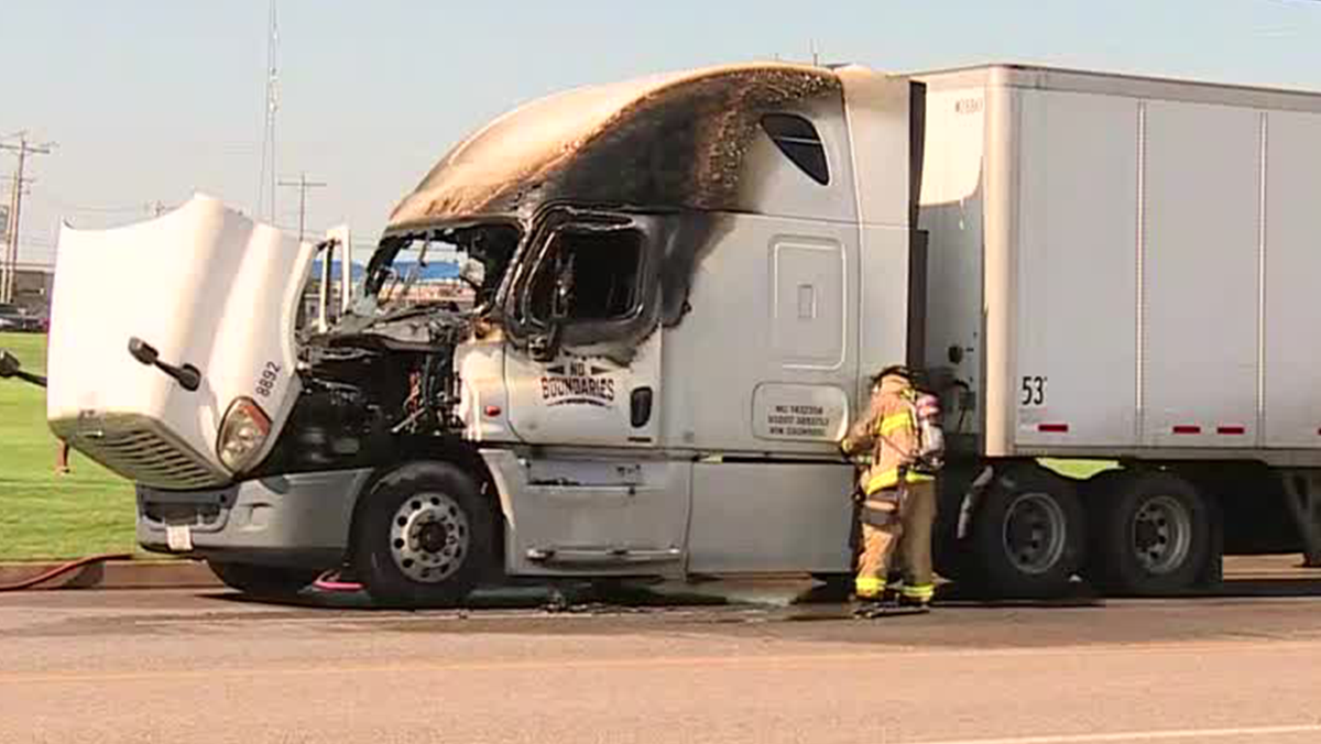 Semi-trailer cab scorched after catching fire along busy road in north OKC