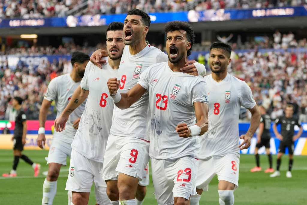 Iran opens its politically charged World Cup