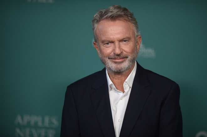 FILE - Sam Neill arrives at the premiere of "Apples Never Fall" on March 12, 2024, in Los Angeles. (Photo by Richard Shotwell/Invision/AP, File)