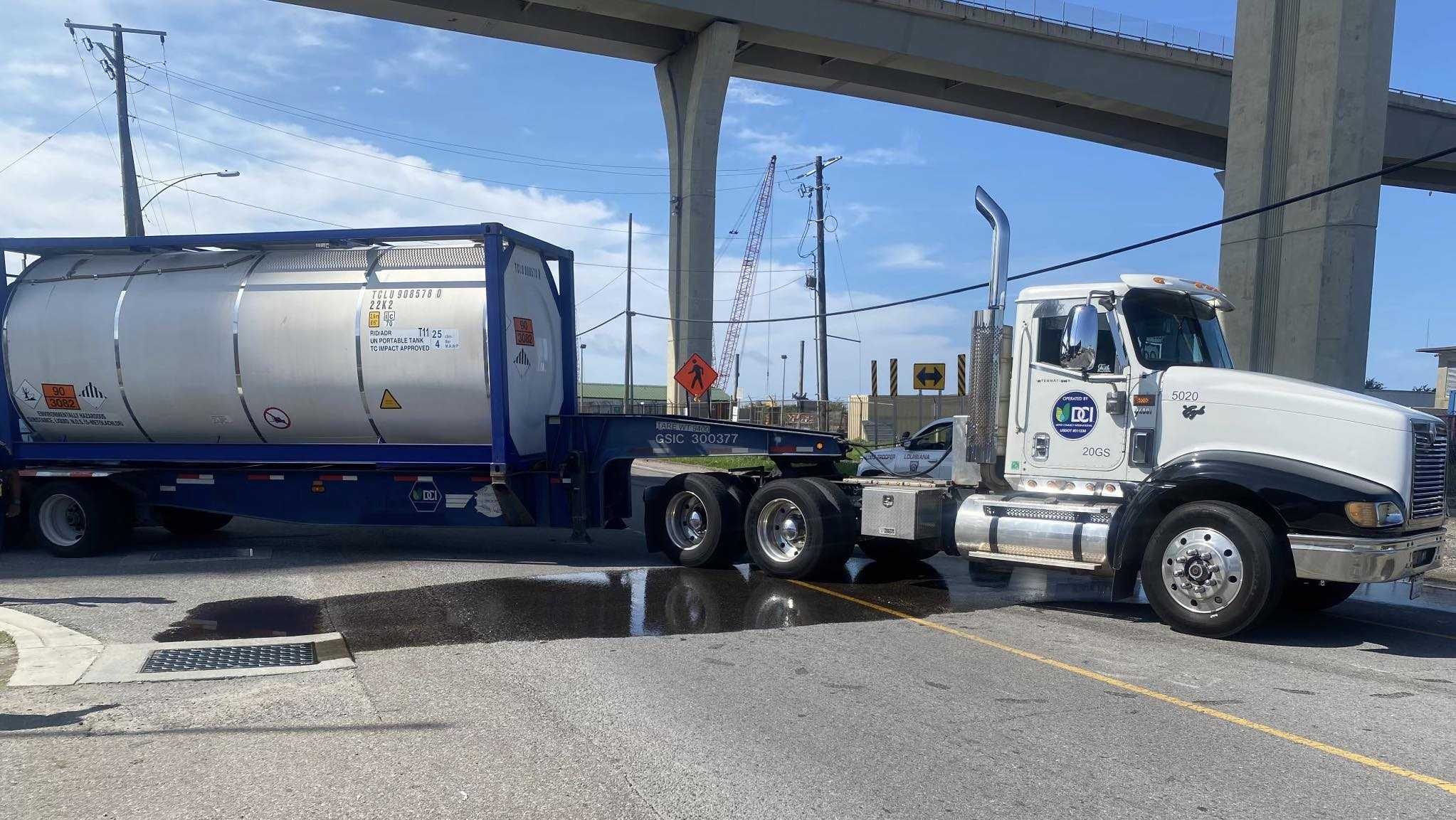Truck spilling hydraulic fluid forces road closure in Harvey