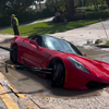 Car swallowed by sinkhole on Crayton Road and towed in Naples