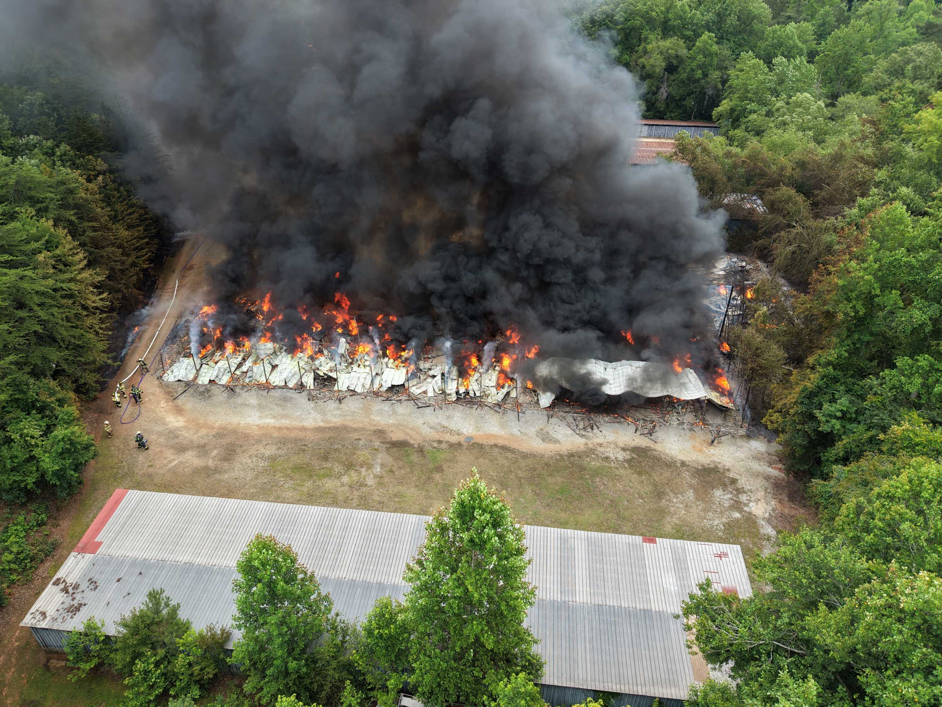 Crews respond to fire at boat storage facility near Upstate lake