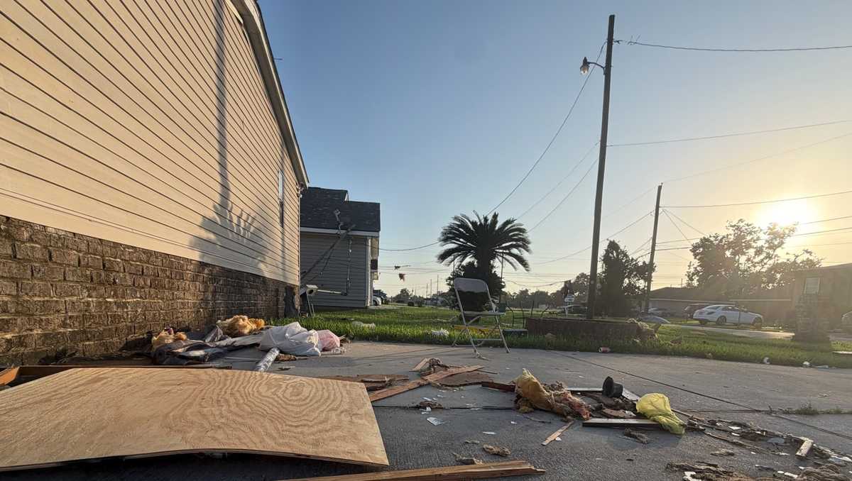 Heat, threat of more rain does not deter residents from Arthur cleanup efforts