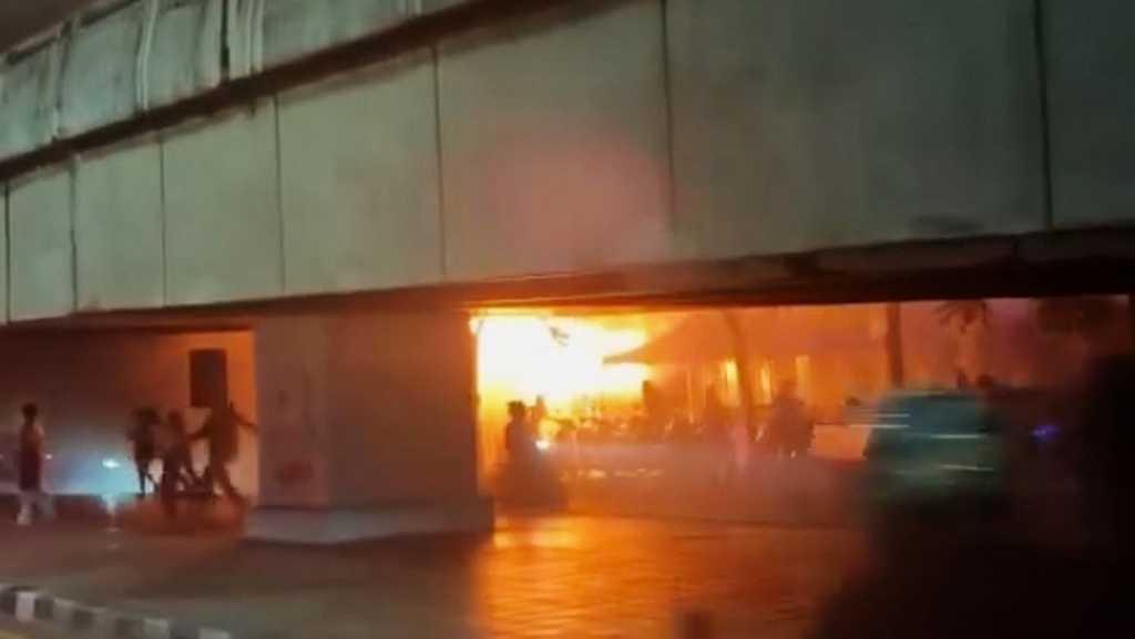 Death toll from a Bangkok music bar fire rises to 30
