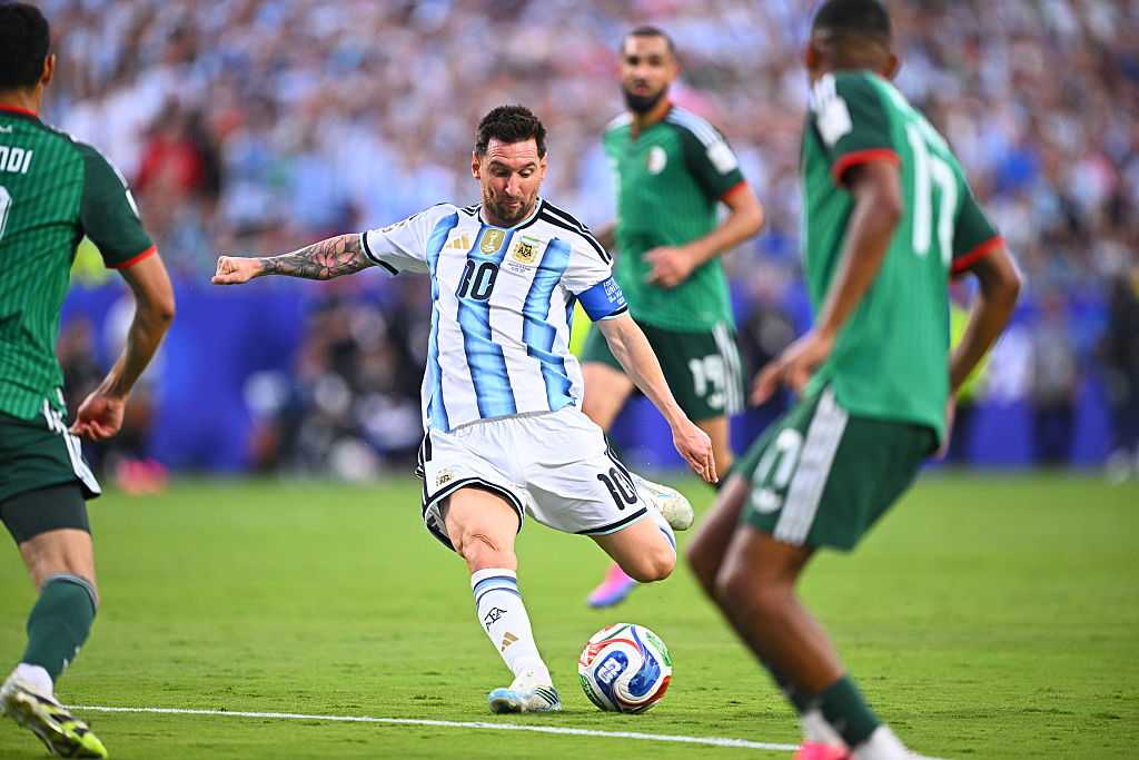 Lionel Messi ties men's World Cup goals record with hat trick
